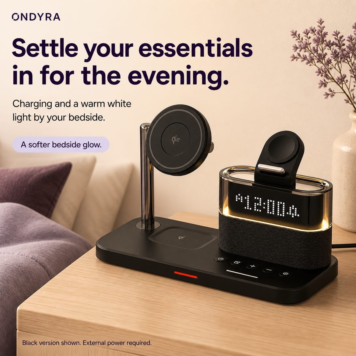 Black charging station with a warm white illuminated clock surround on an oak bedside table beside cream bedding.